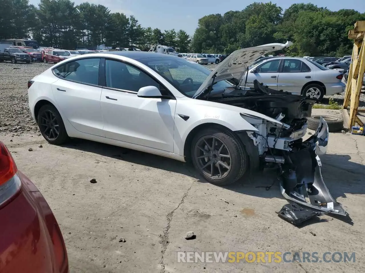 4 Photograph of a damaged car 5YJ3E1EA7PF688922 TESLA MODEL 3 2023