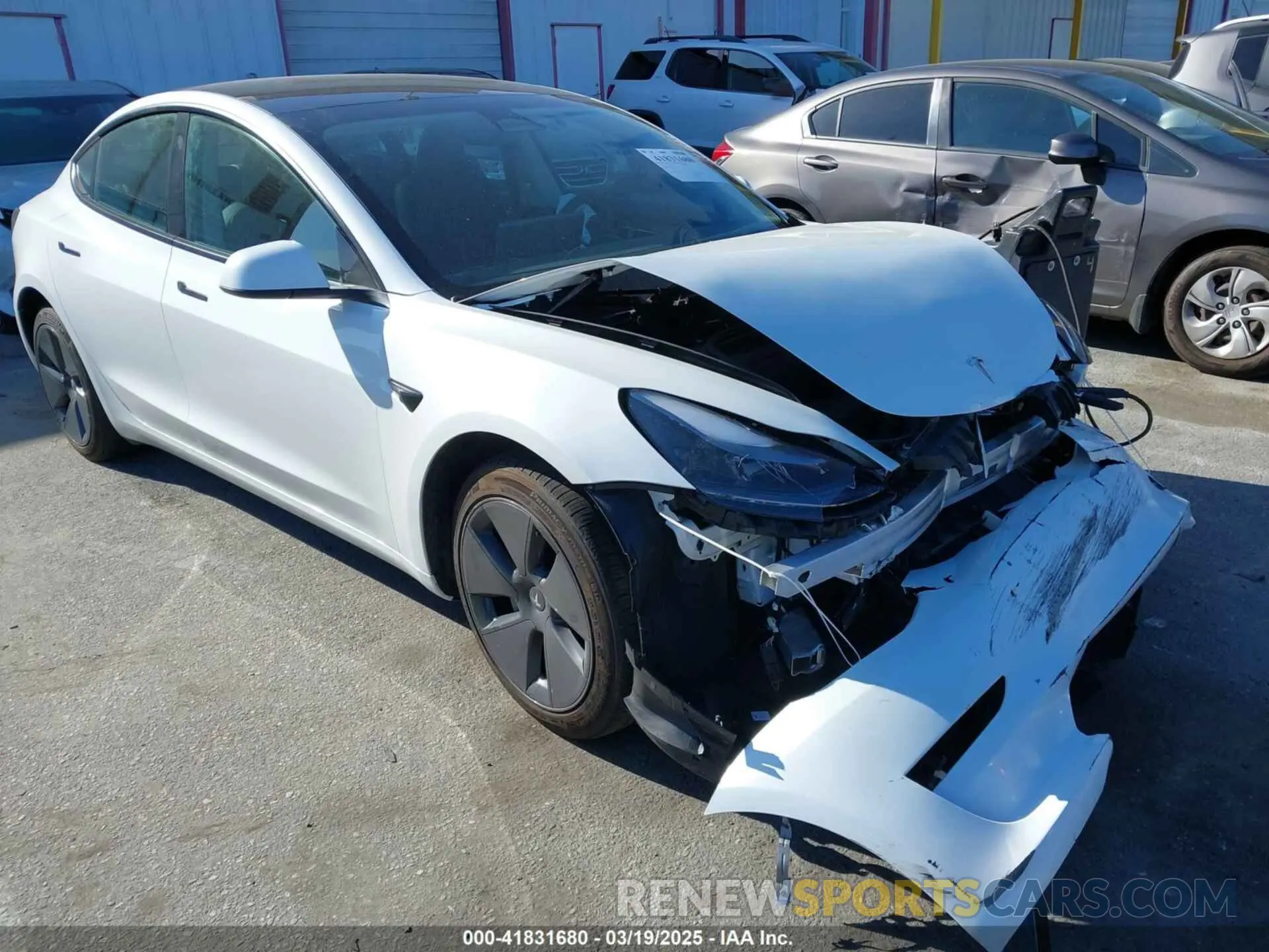 1 Photograph of a damaged car 5YJ3E1EA7PF693103 TESLA MODEL 3 2023
