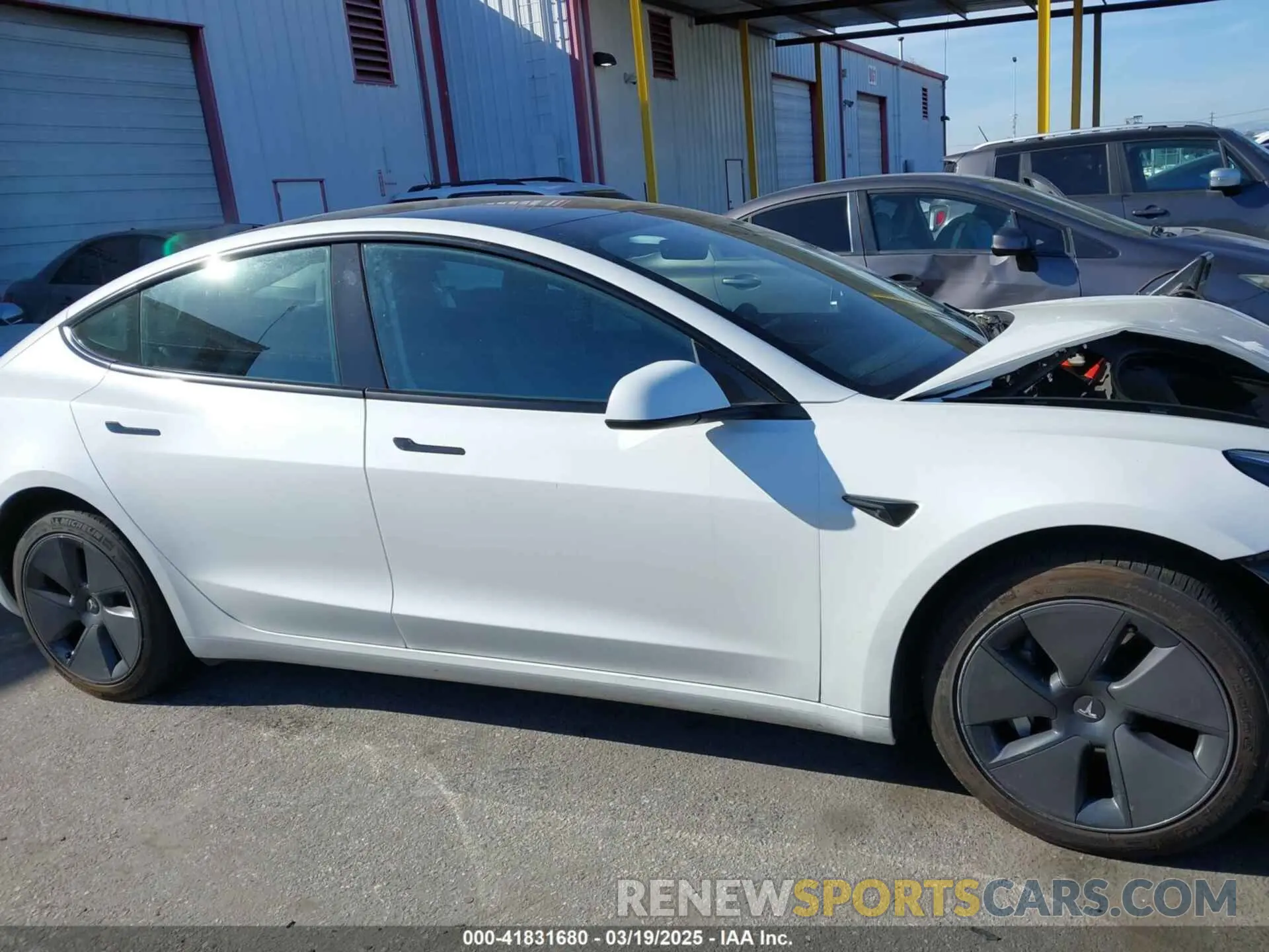 12 Photograph of a damaged car 5YJ3E1EA7PF693103 TESLA MODEL 3 2023