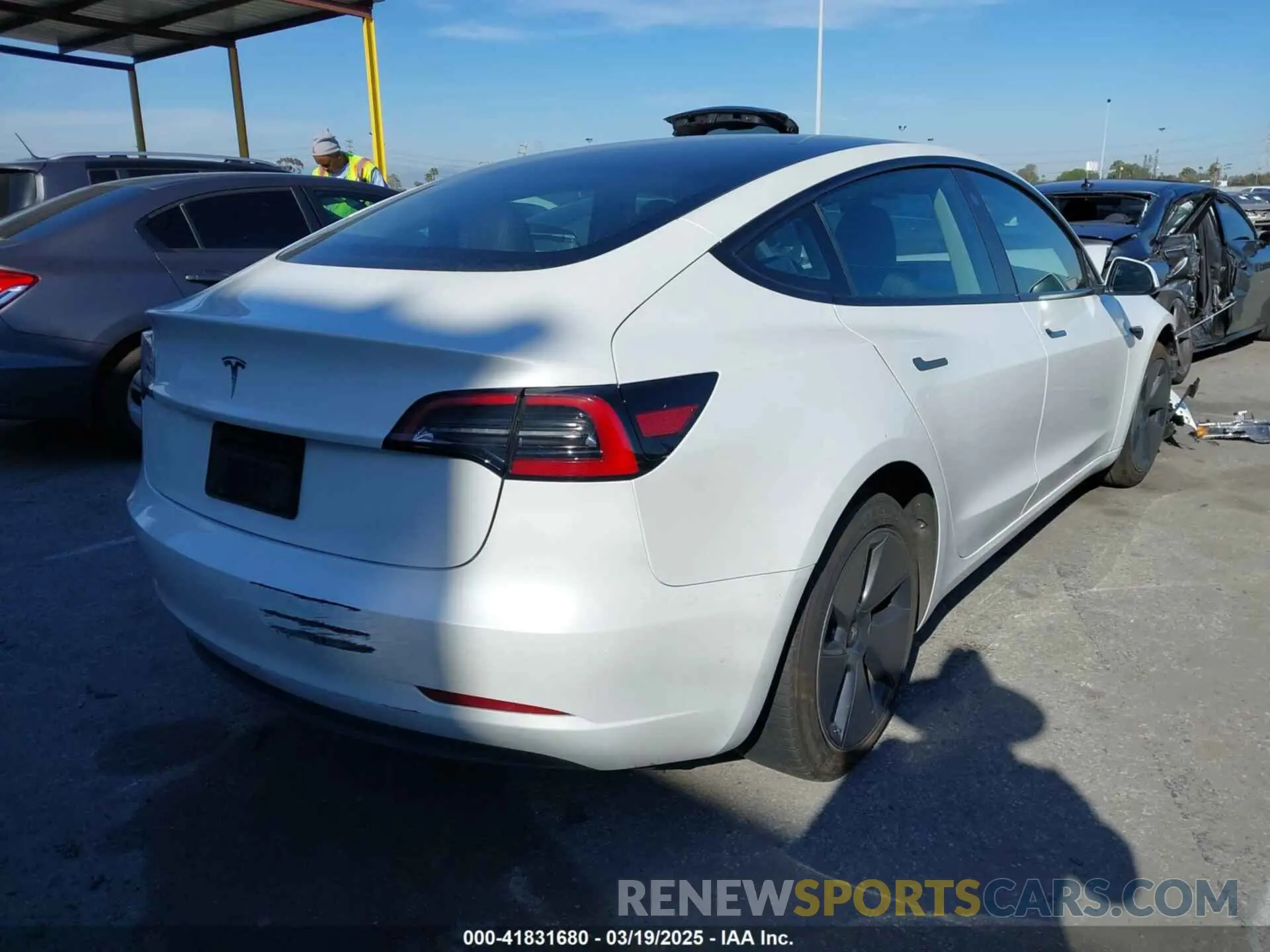 4 Photograph of a damaged car 5YJ3E1EA7PF693103 TESLA MODEL 3 2023
