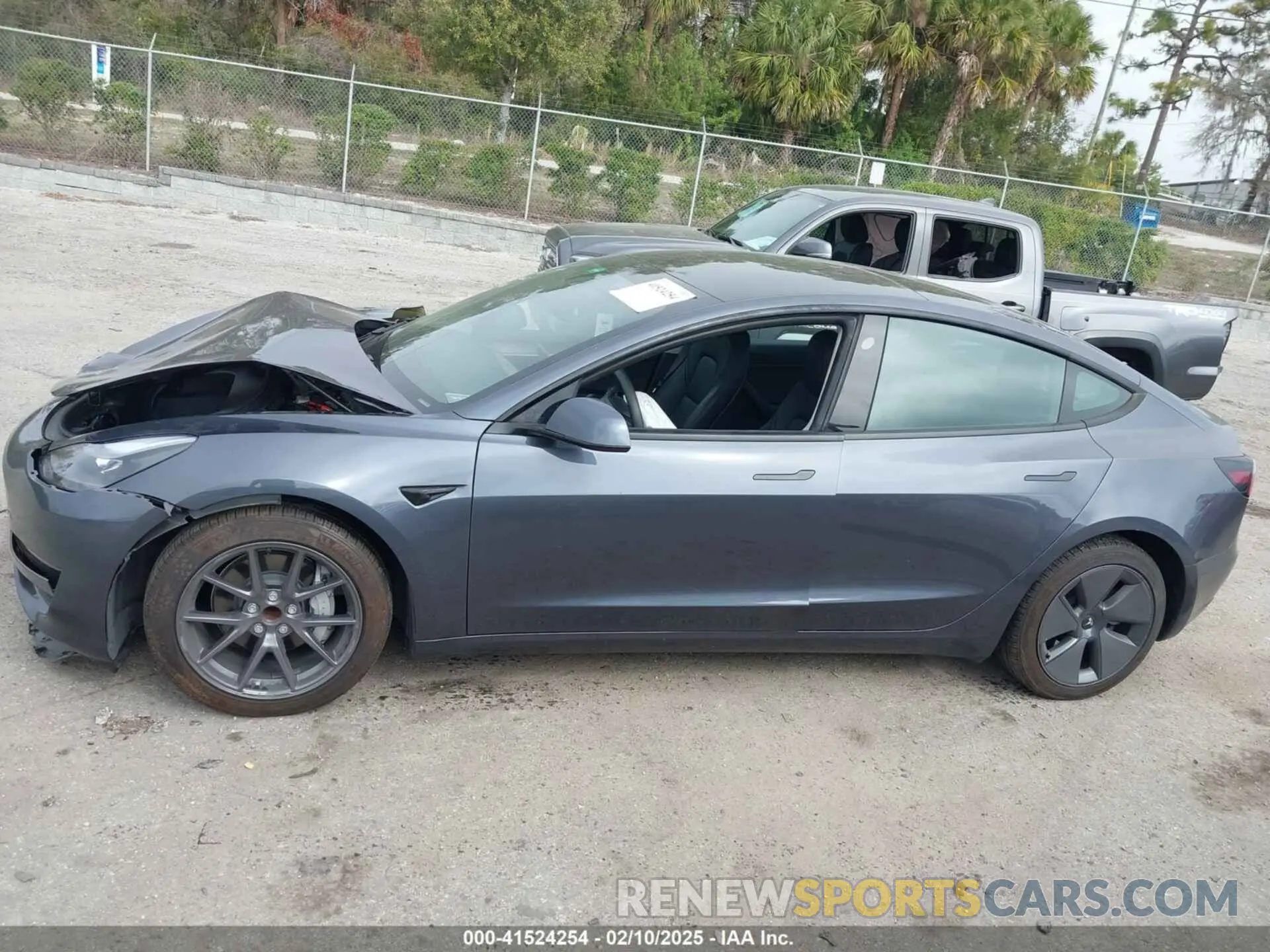14 Photograph of a damaged car 5YJ3E1EA7PF710871 TESLA MODEL 3 2023