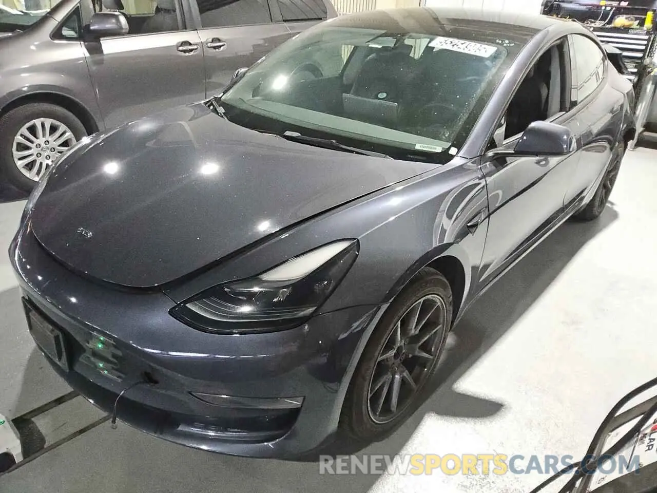 1 Photograph of a damaged car 5YJ3E1EA8PF447841 TESLA MODEL 3 2023