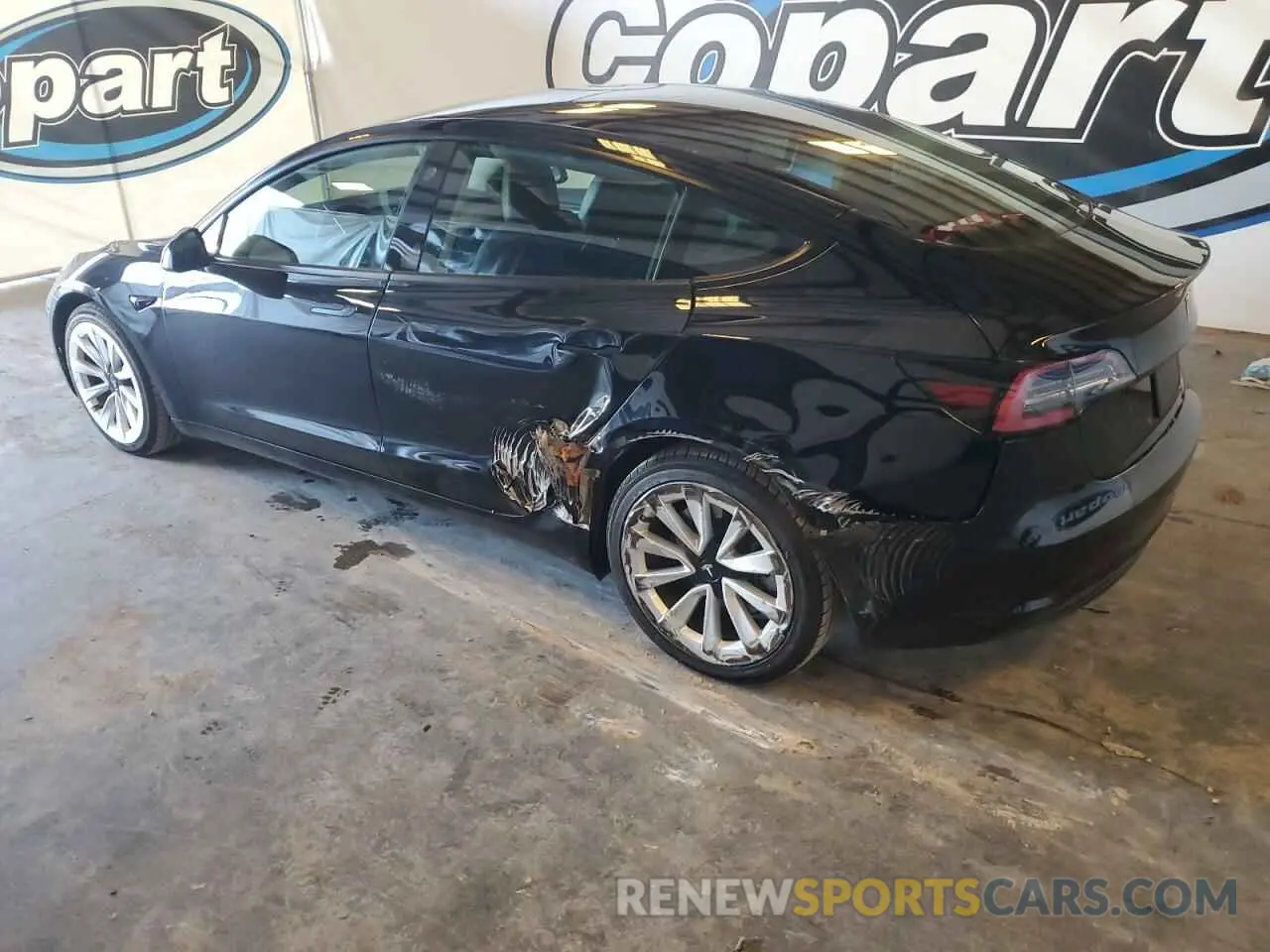 2 Photograph of a damaged car 5YJ3E1EA8PF450755 TESLA MODEL 3 2023