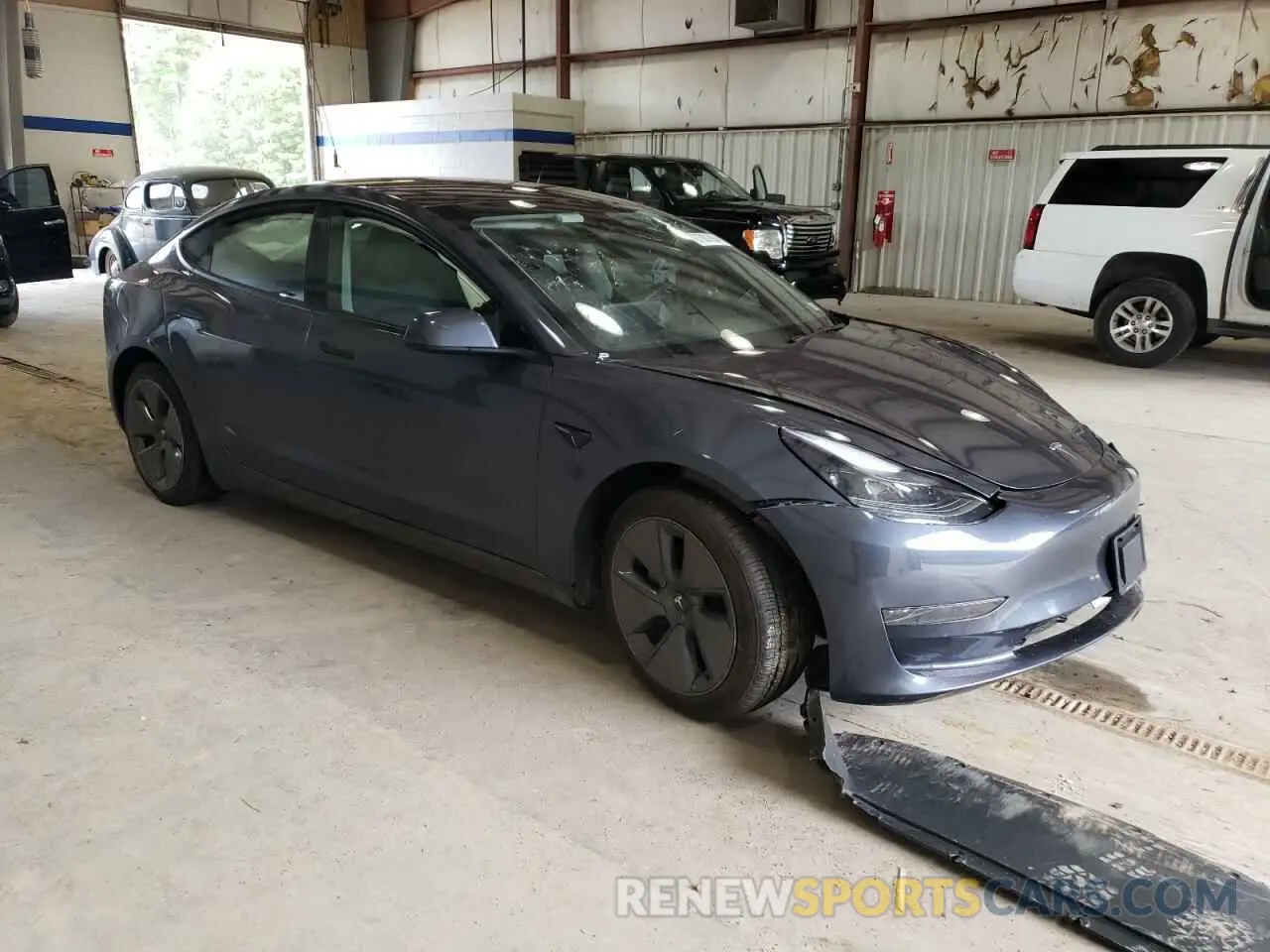 4 Photograph of a damaged car 5YJ3E1EA8PF509979 TESLA MODEL 3 2023