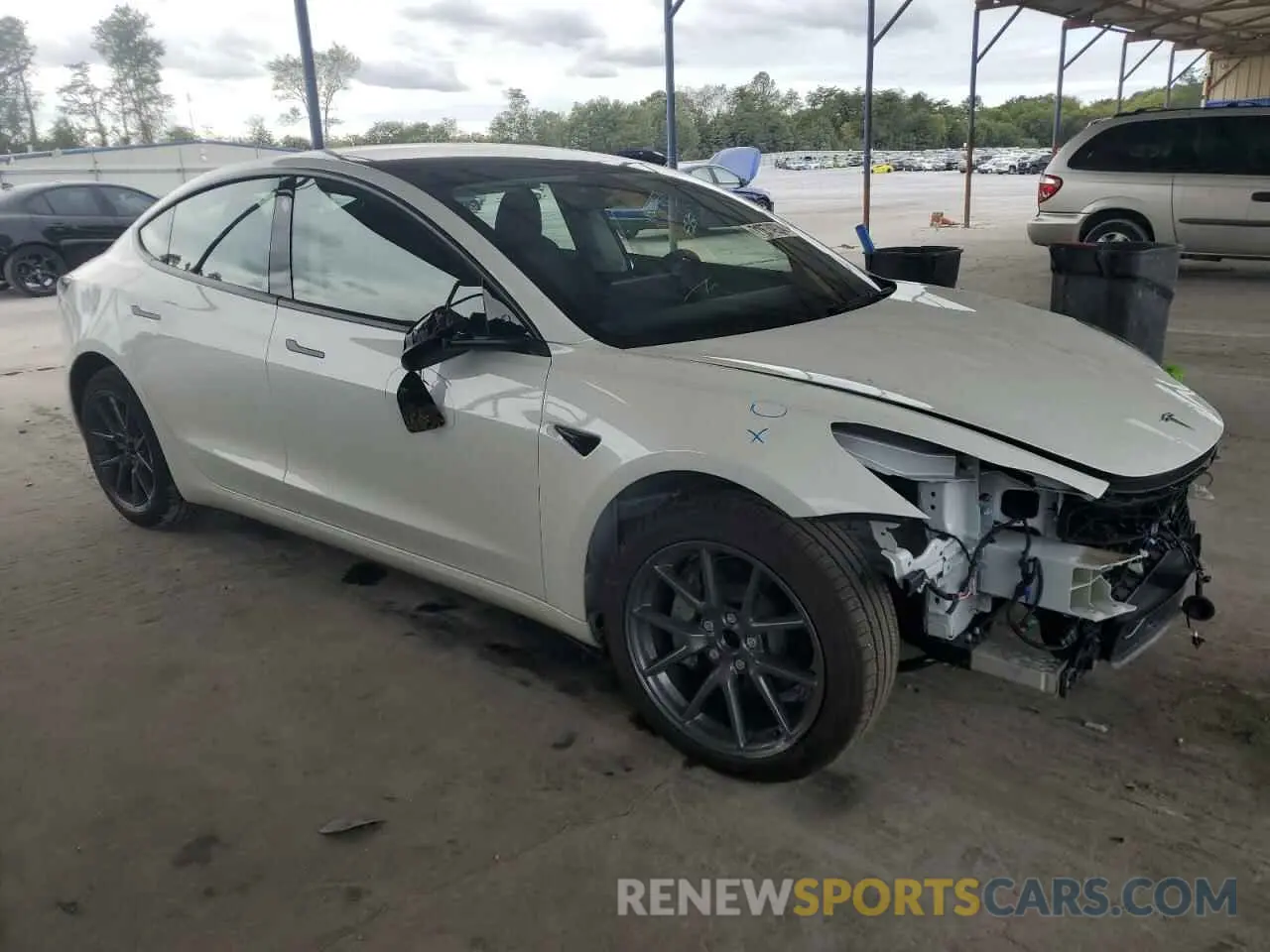 4 Photograph of a damaged car 5YJ3E1EA8PF601514 TESLA MODEL 3 2023