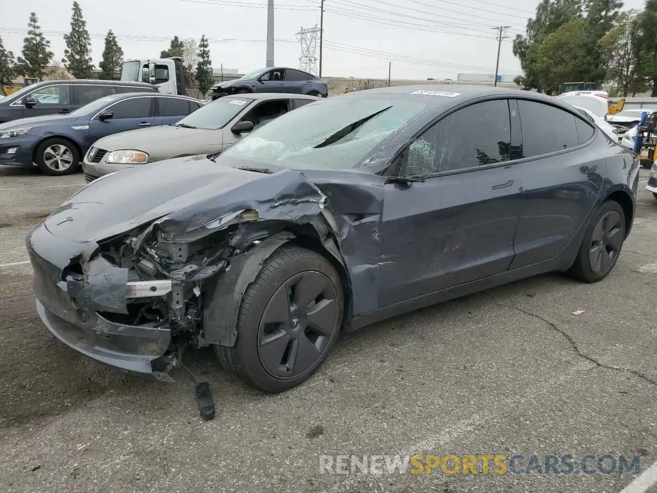1 Photograph of a damaged car 5YJ3E1EA8PF620032 TESLA MODEL 3 2023