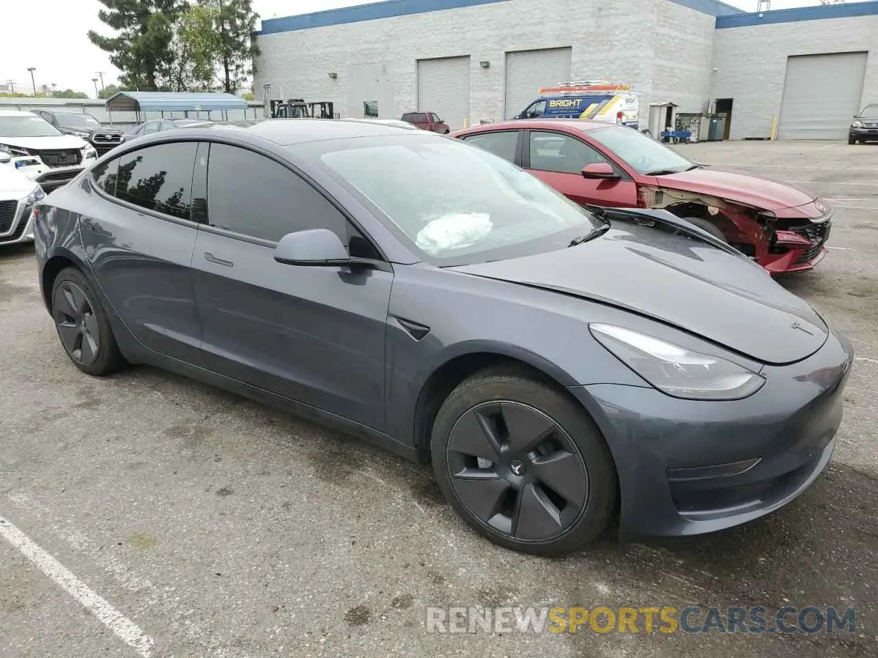 4 Photograph of a damaged car 5YJ3E1EA8PF620032 TESLA MODEL 3 2023