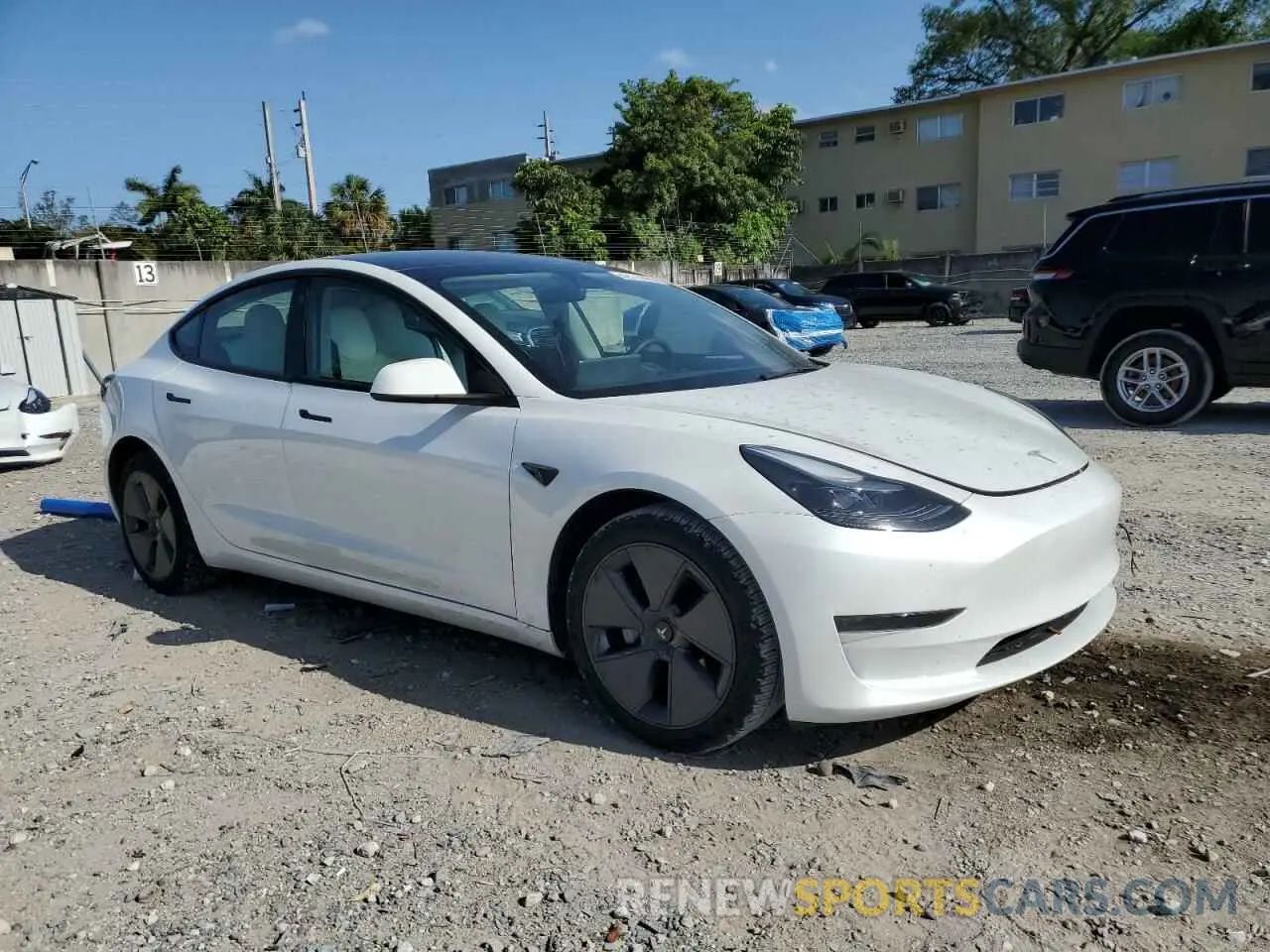 4 Photograph of a damaged car 5YJ3E1EA9PF500823 TESLA MODEL 3 2023