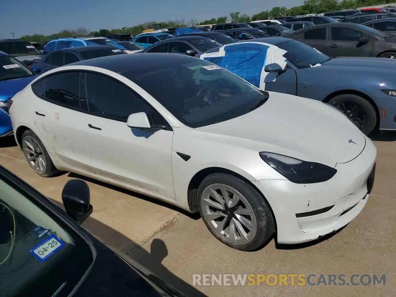 4 Photograph of a damaged car 5YJ3E1EA9PF510588 TESLA MODEL 3 2023