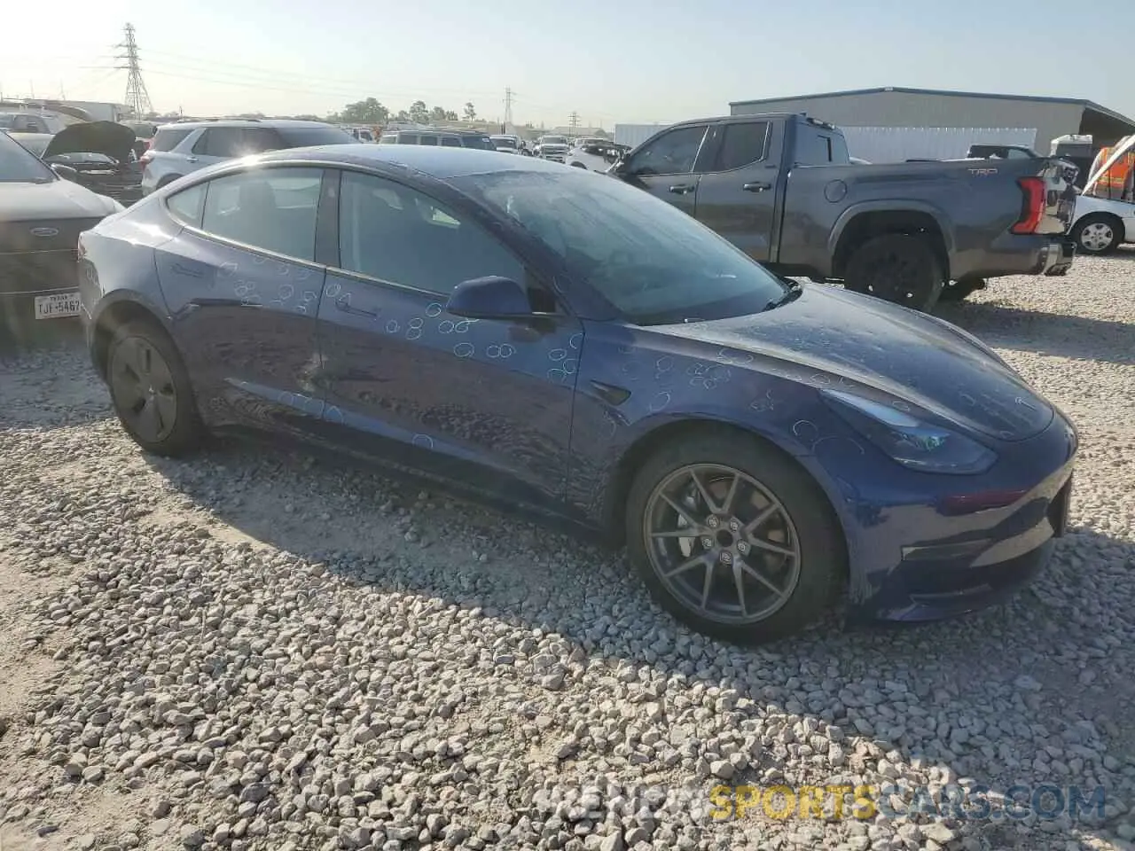 4 Photograph of a damaged car 5YJ3E1EA9PF712542 TESLA MODEL 3 2023