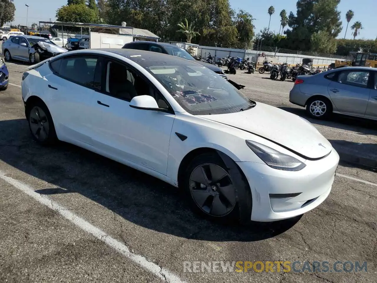 4 Photograph of a damaged car 5YJ3E1EAXPF412542 TESLA MODEL 3 2023