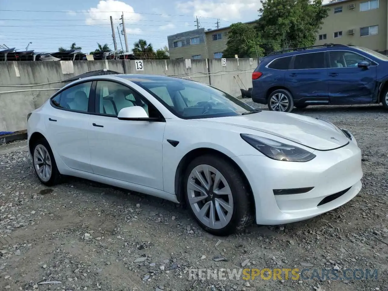 4 Photograph of a damaged car 5YJ3E1EAXPF422956 TESLA MODEL 3 2023