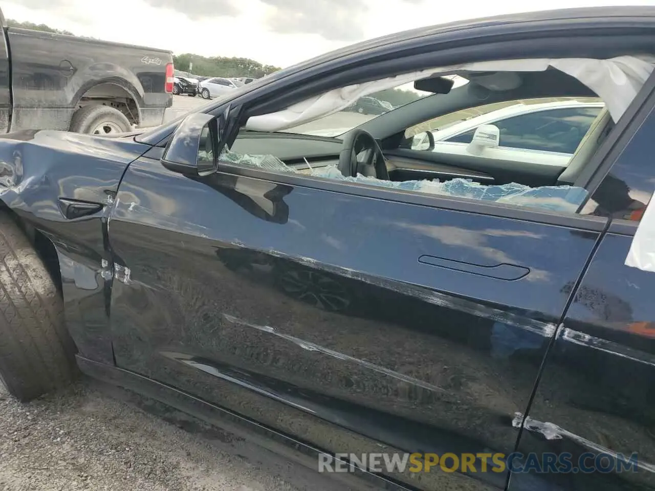 7 Photograph of a damaged car 5YJ3E1EAXPF451714 TESLA MODEL 3 2023