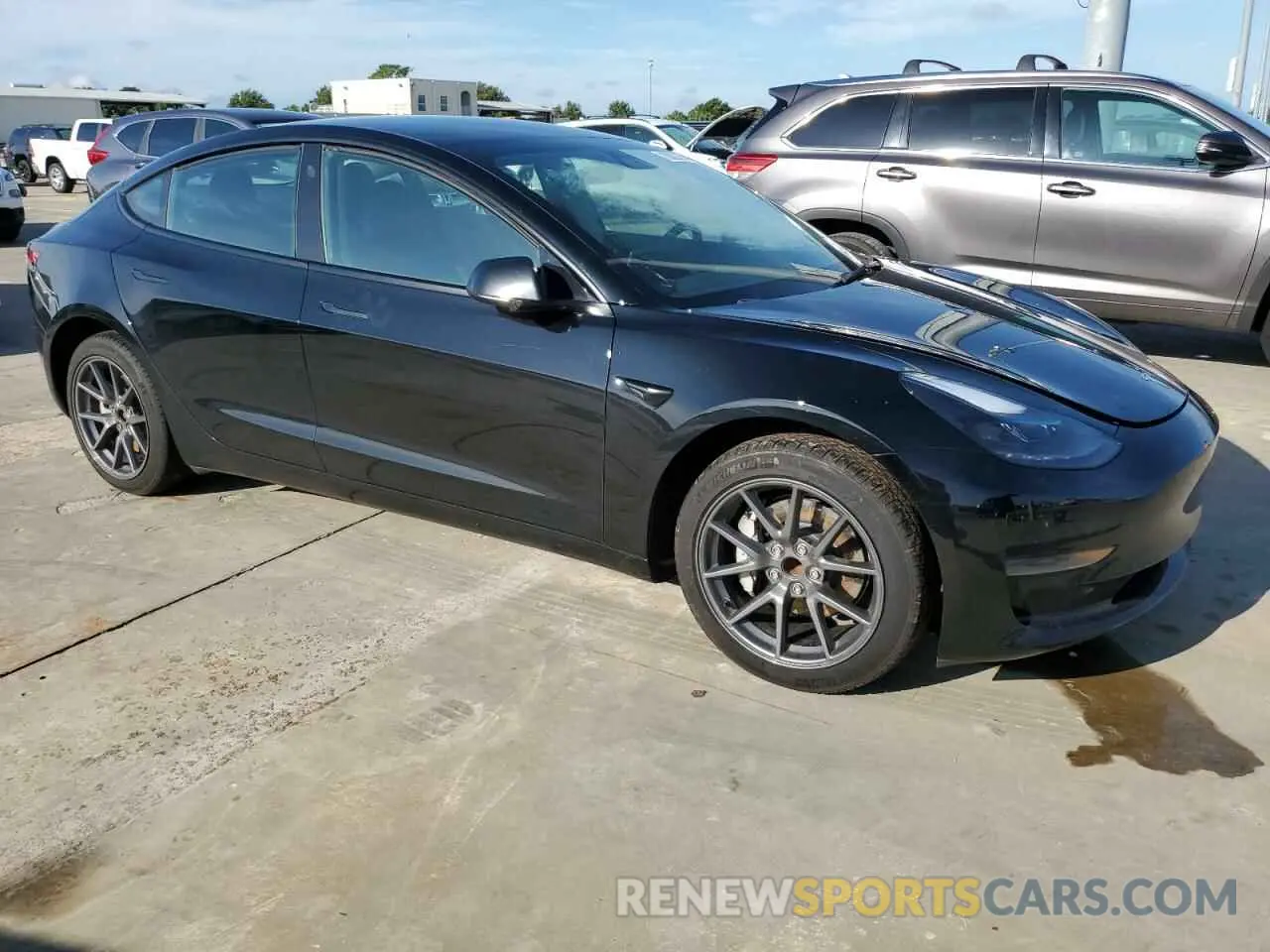 4 Photograph of a damaged car 5YJ3E1EAXPF501480 TESLA MODEL 3 2023
