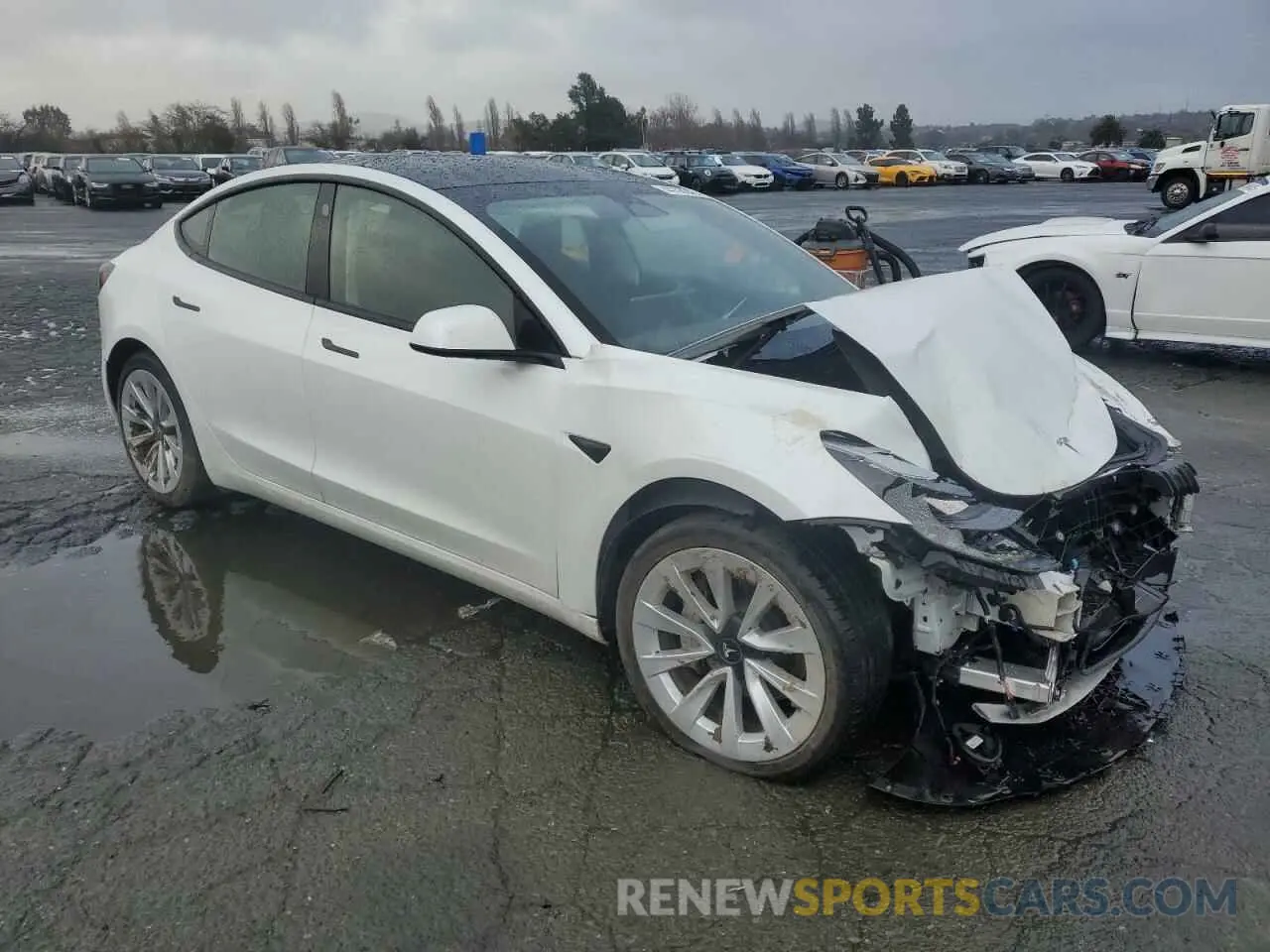 4 Photograph of a damaged car 5YJ3E1EAXPF544233 TESLA MODEL 3 2023