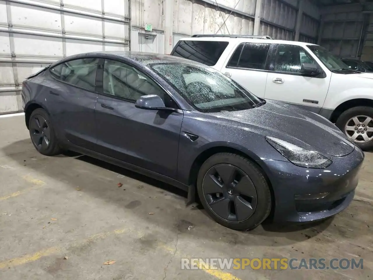 4 Photograph of a damaged car 5YJ3E1EAXPF558830 TESLA MODEL 3 2023
