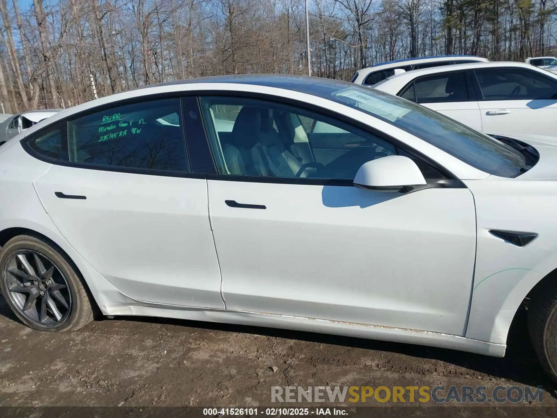 14 Photograph of a damaged car 5YJ3E1EAXPF572744 TESLA MODEL 3 2023