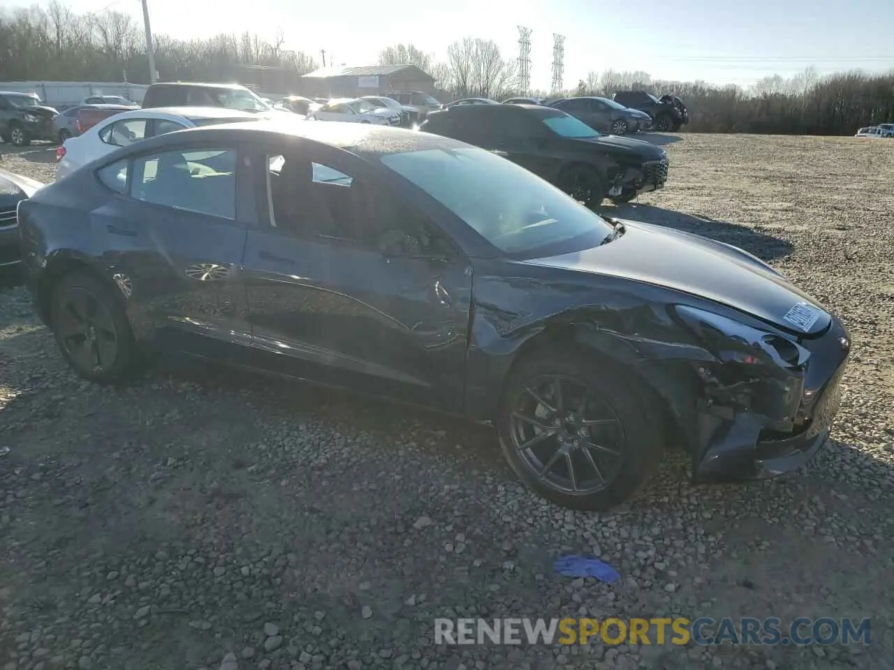 4 Photograph of a damaged car 5YJ3E1EAXPF594257 TESLA MODEL 3 2023