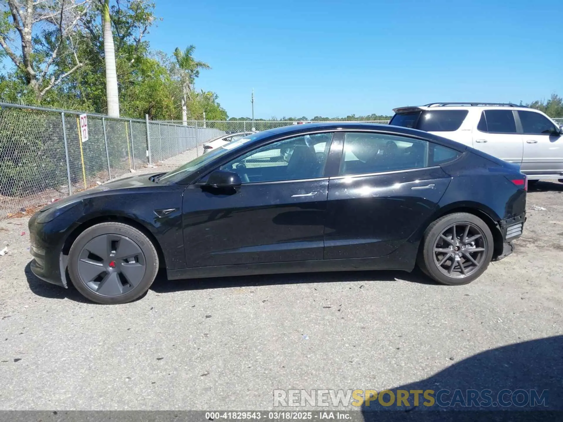 14 Photograph of a damaged car 5YJ3E1EAXPF623403 TESLA MODEL 3 2023