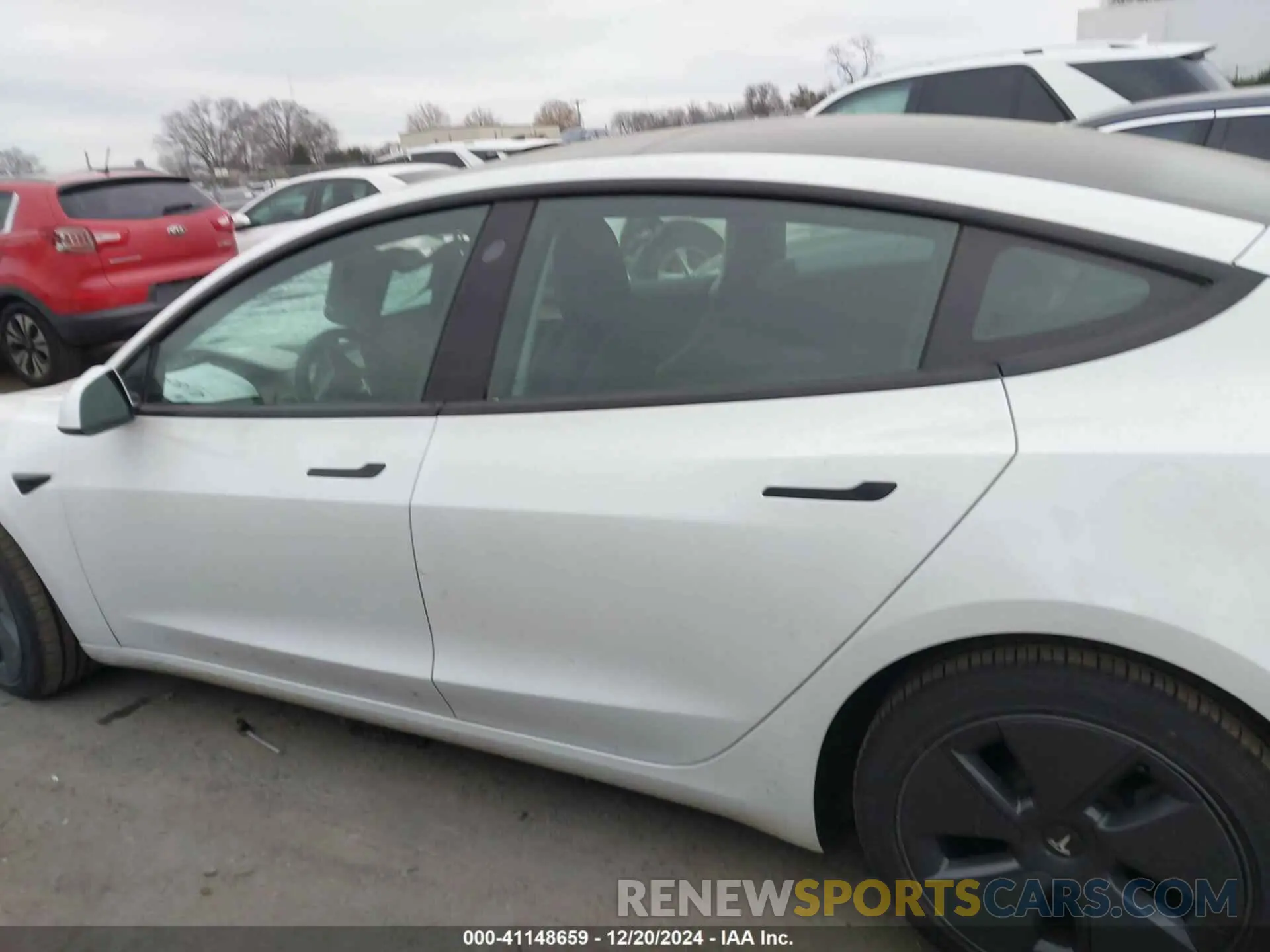 14 Photograph of a damaged car 5YJ3E1EB0PF389457 TESLA MODEL 3 2023