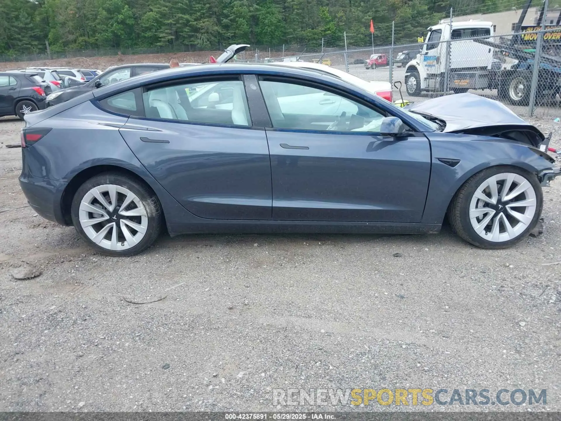 13 Photograph of a damaged car 5YJ3E1EB0PF389992 TESLA MODEL 3 2023