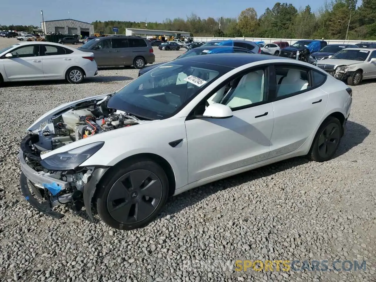 1 Photograph of a damaged car 5YJ3E1EB0PF593188 TESLA MODEL 3 2023