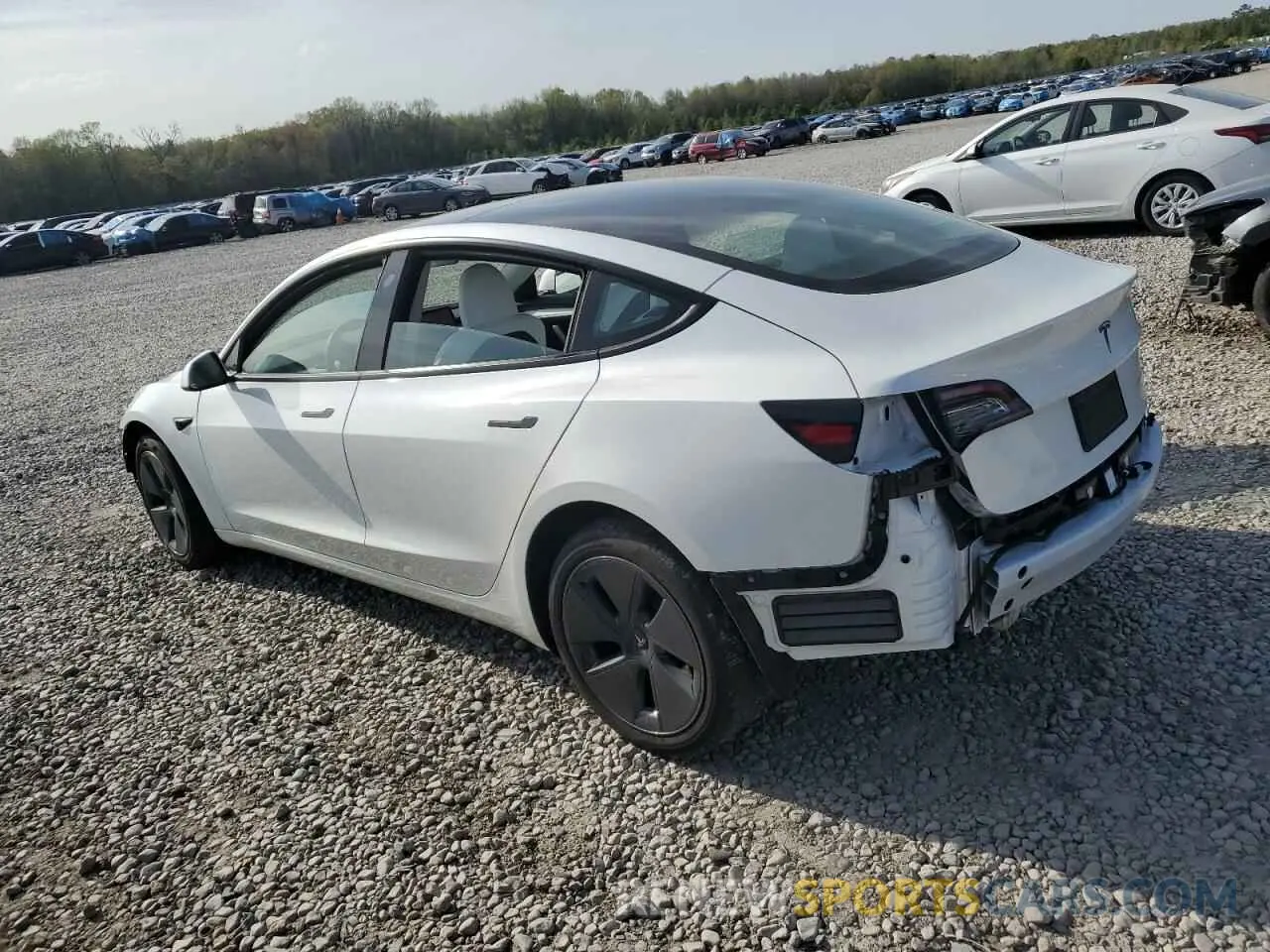 2 Photograph of a damaged car 5YJ3E1EB0PF593188 TESLA MODEL 3 2023