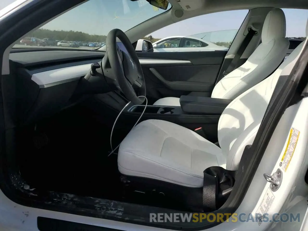 7 Photograph of a damaged car 5YJ3E1EB0PF593188 TESLA MODEL 3 2023