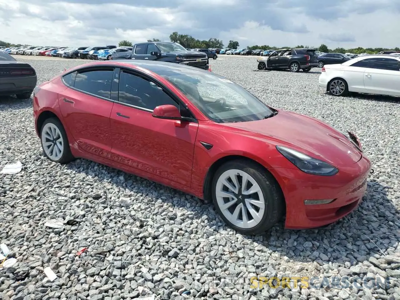 4 Photograph of a damaged car 5YJ3E1EB1PF391220 TESLA MODEL 3 2023