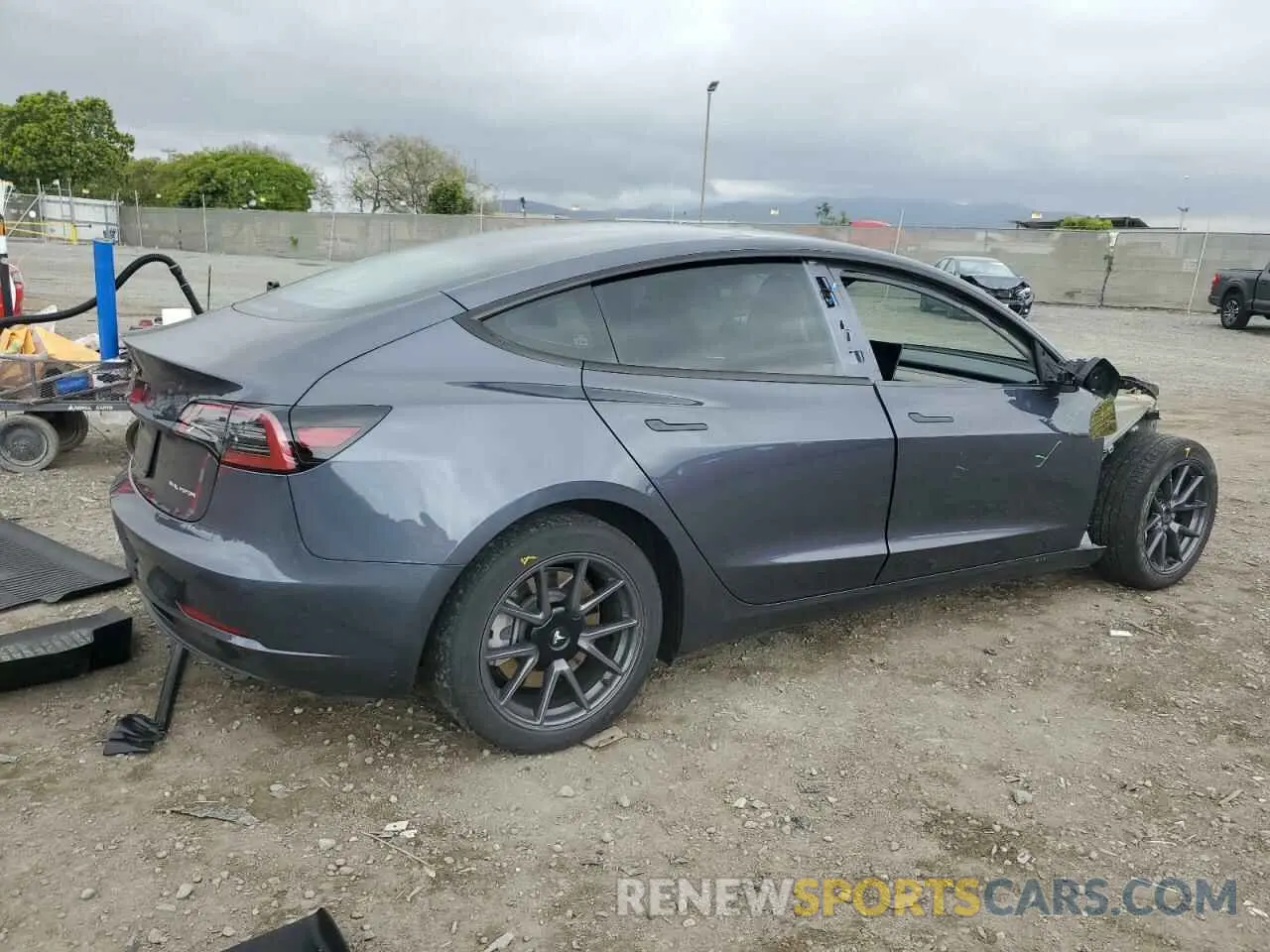 3 Photograph of a damaged car 5YJ3E1EB2PF694247 TESLA MODEL 3 2023