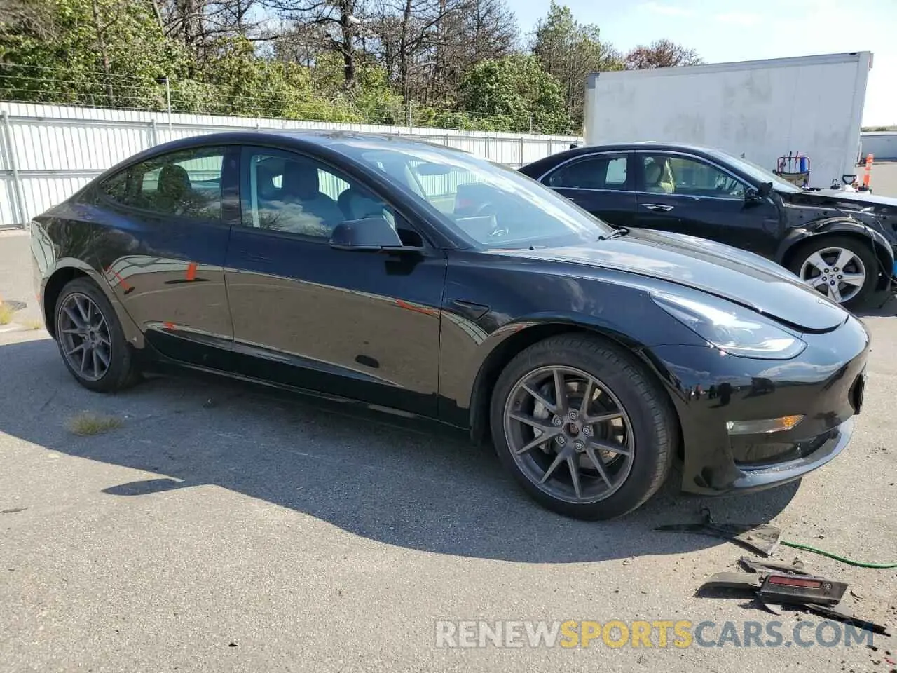 4 Photograph of a damaged car 5YJ3E1EB3PF595954 TESLA MODEL 3 2023