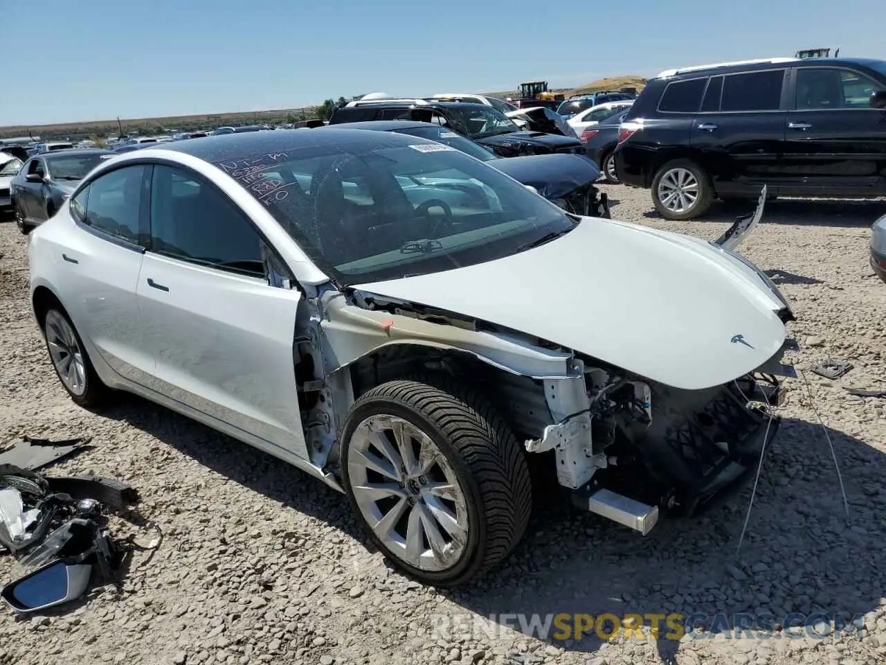 4 Photograph of a damaged car 5YJ3E1EB3PF608248 TESLA MODEL 3 2023