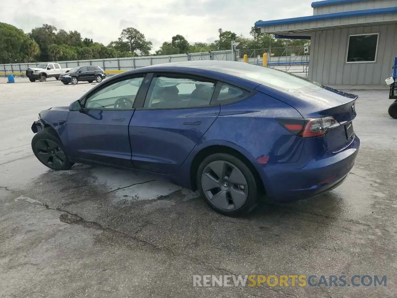 2 Photograph of a damaged car 5YJ3E1EB4PF390885 TESLA MODEL 3 2023