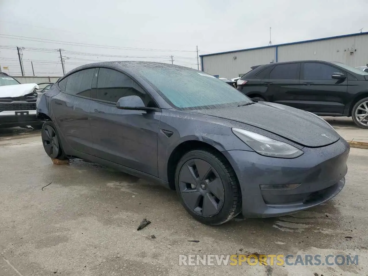 4 Photograph of a damaged car 5YJ3E1EB4PF665395 TESLA MODEL 3 2023