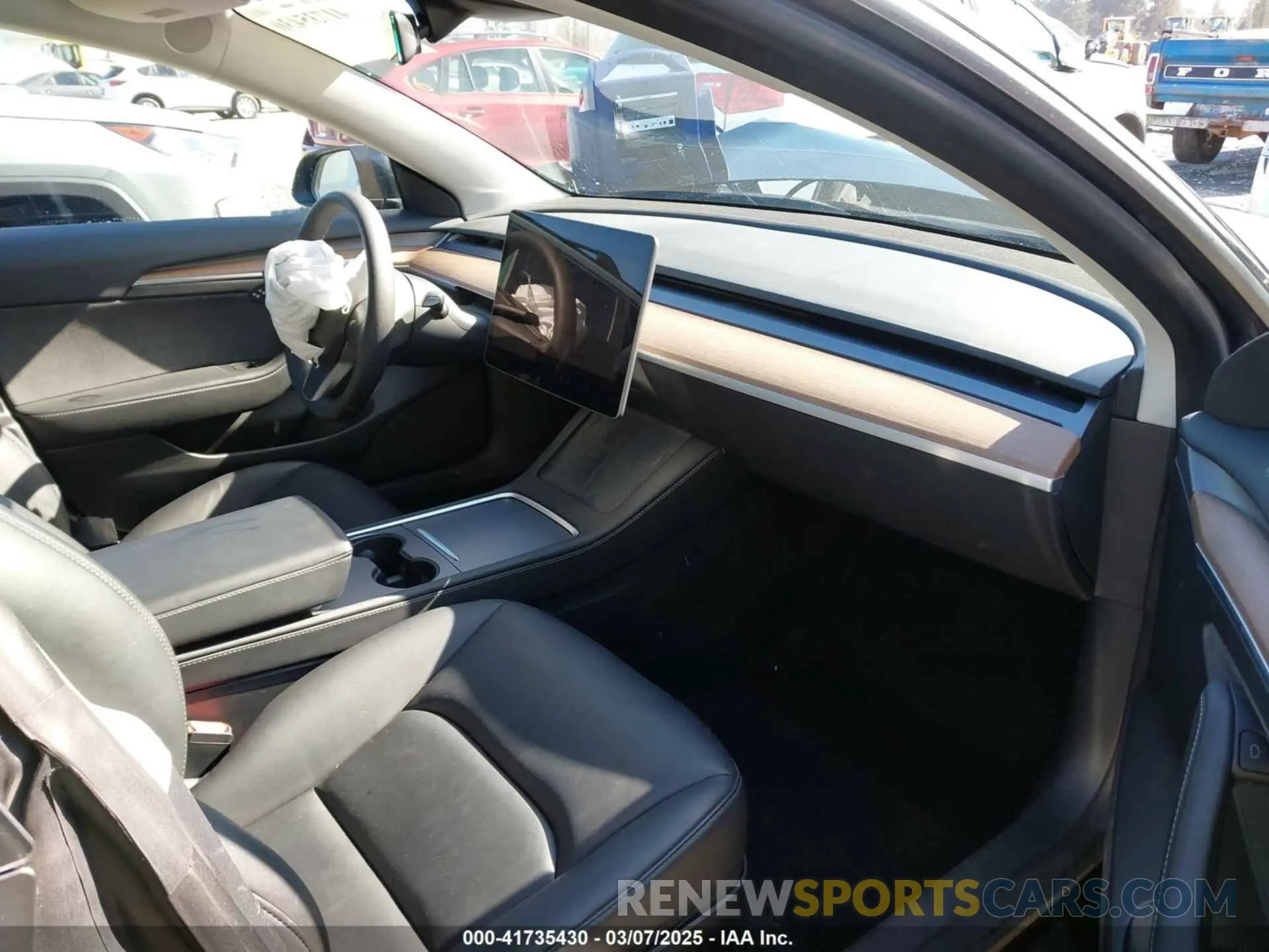 5 Photograph of a damaged car 5YJ3E1EB7PF657274 TESLA MODEL 3 2023