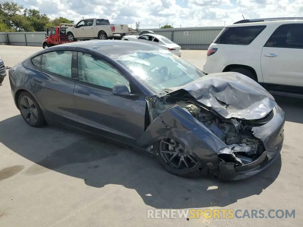 4 Photograph of a damaged car 5YJ3E1EB8PF631492 TESLA MODEL 3 2023