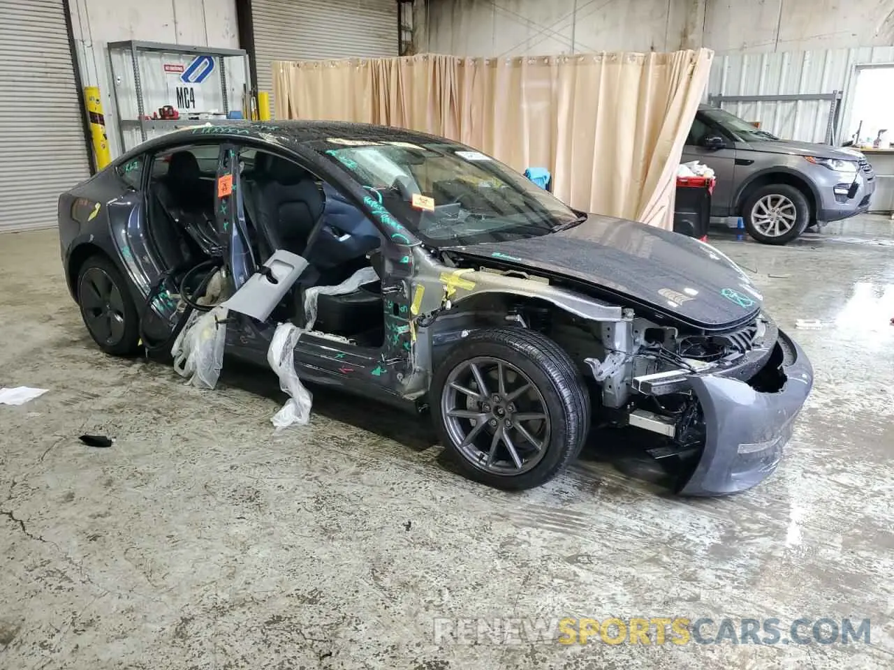 4 Photograph of a damaged car 5YJ3E1EB9PF636121 TESLA MODEL 3 2023