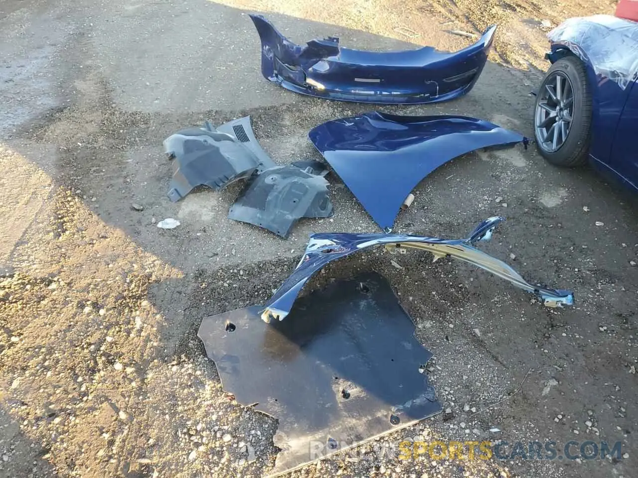 12 Photograph of a damaged car 5YJ3E1EB9PF636474 TESLA MODEL 3 2023