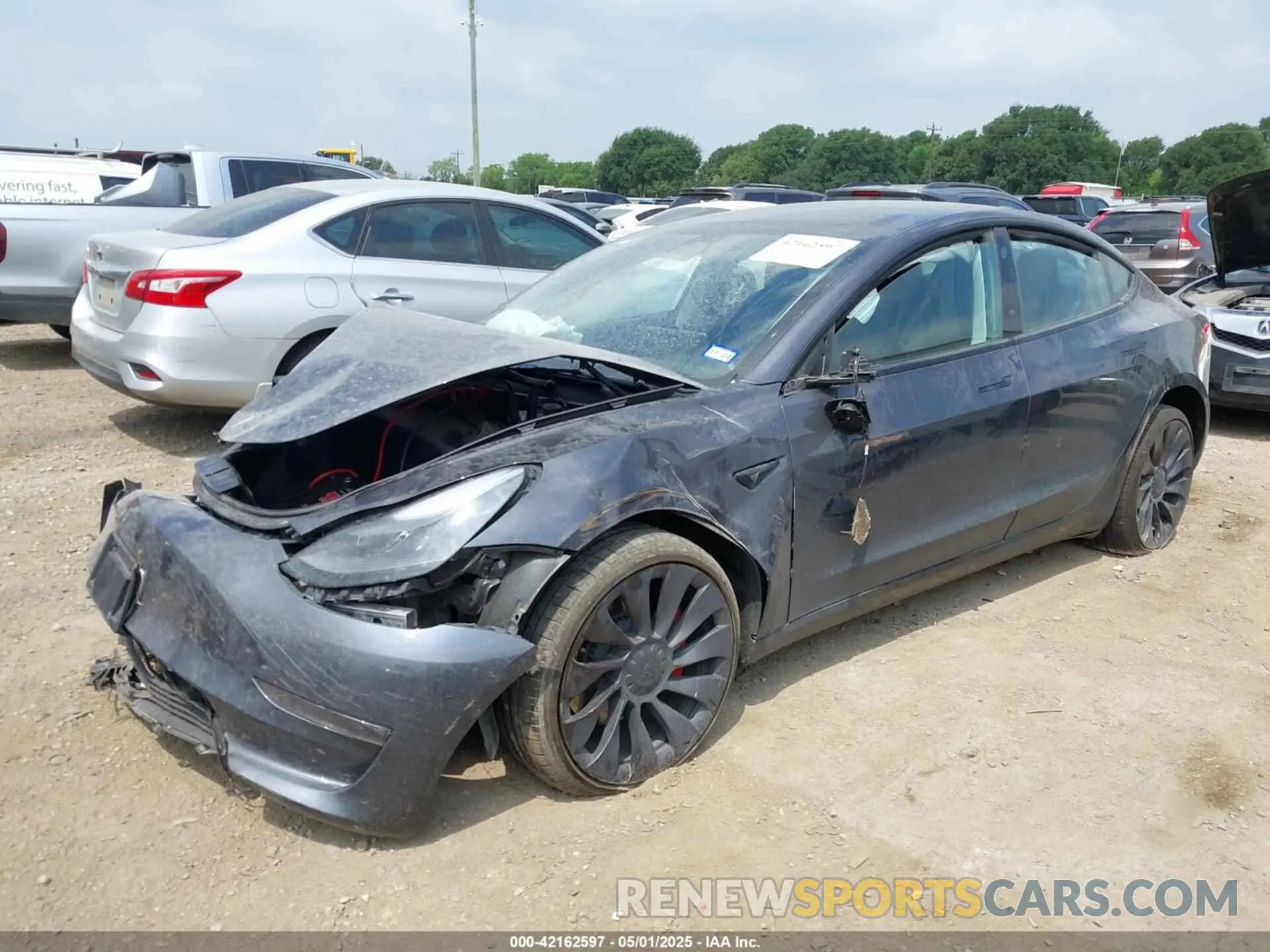 2 Photograph of a damaged car 5YJ3E1EC1PF678145 TESLA MODEL 3 2023
