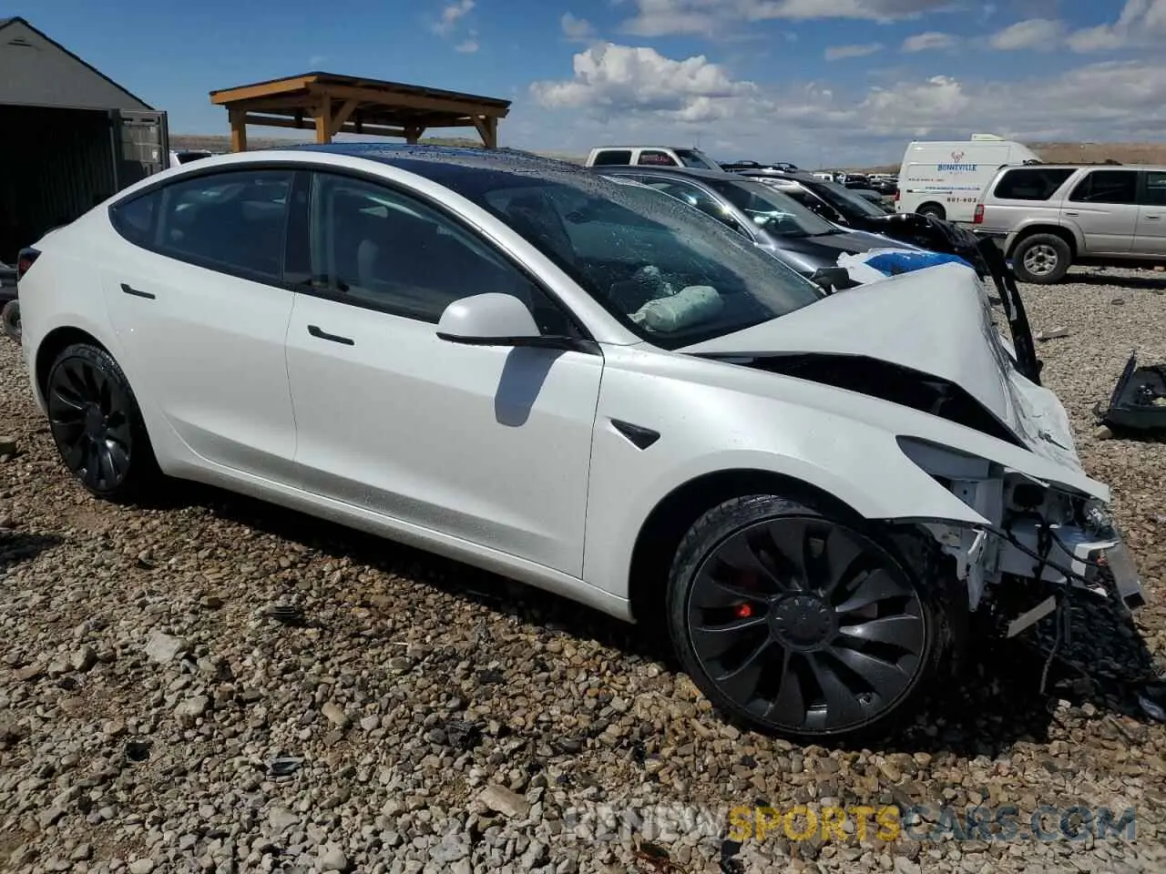 4 Фотография поврежденного автомобиля 5YJ3E1EC1PF706879 TESLA MODEL 3 2023