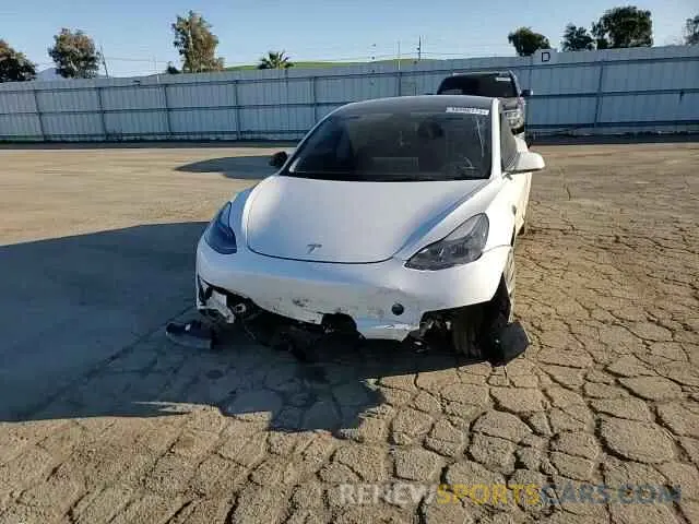 11 Photograph of a damaged car 5YJ3E1EC3PF556807 TESLA MODEL 3 2023