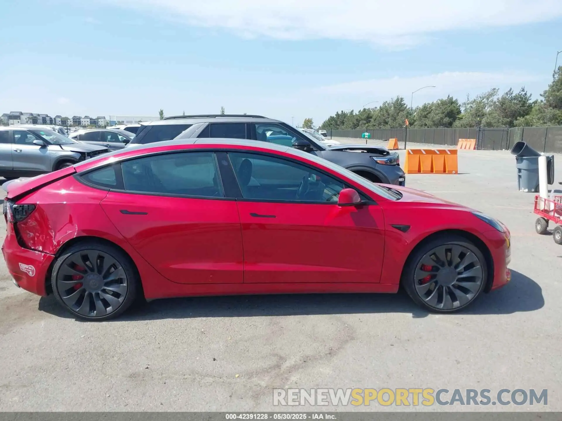 12 Photograph of a damaged car 5YJ3E1EC4PF393777 TESLA MODEL 3 2023