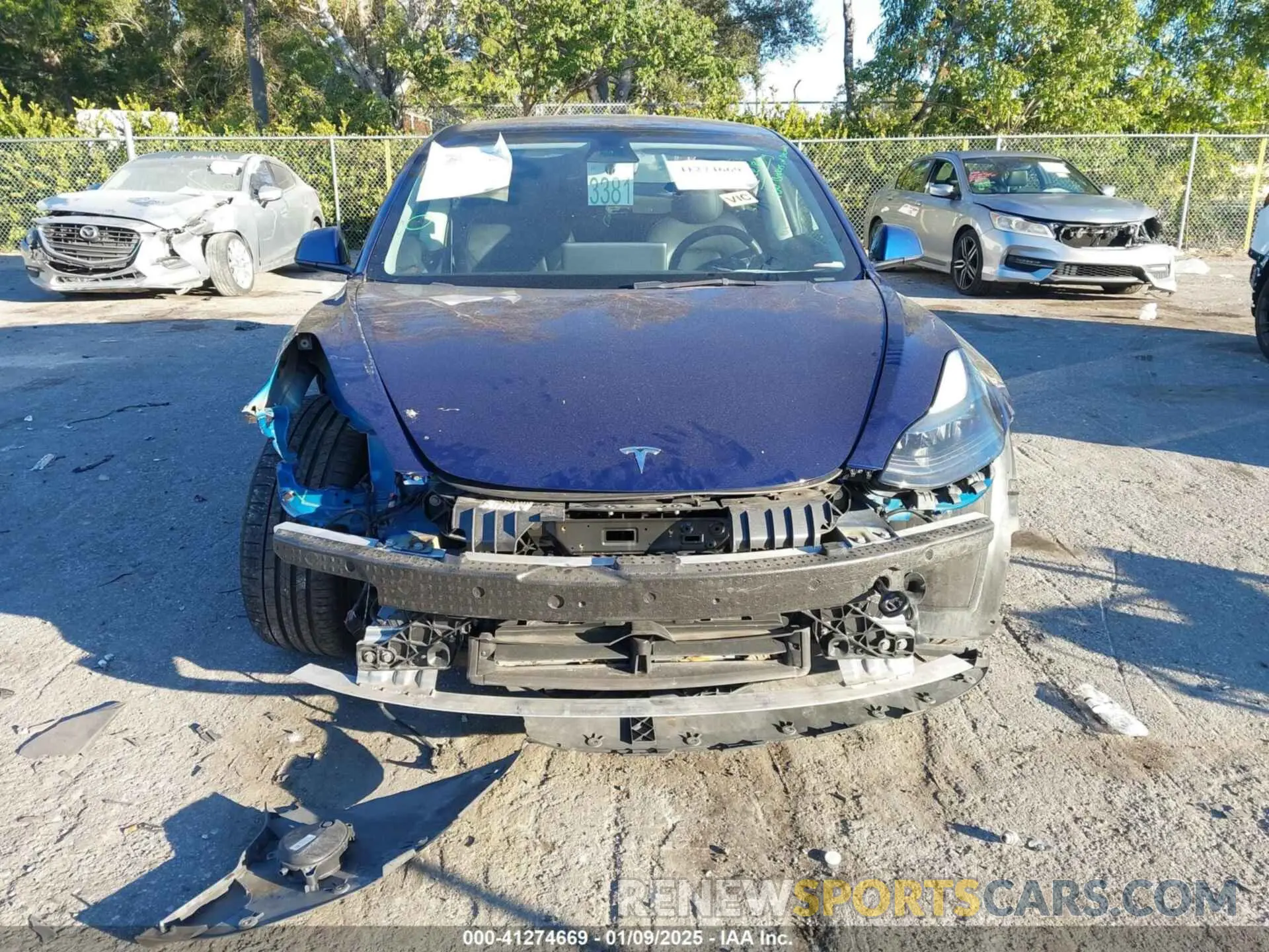 12 Photograph of a damaged car 5YJ3E1EC4PF404521 TESLA MODEL 3 2023