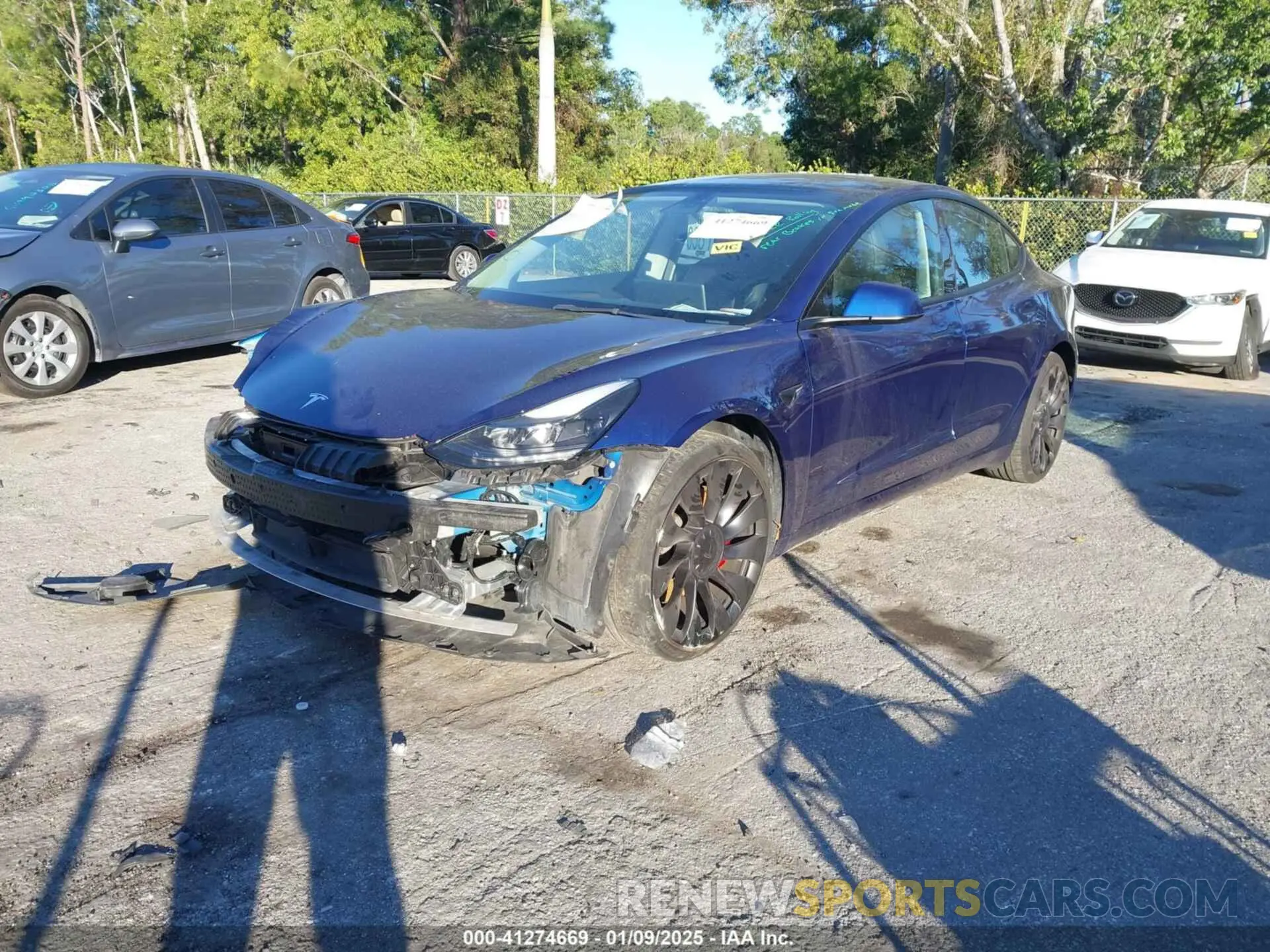 2 Photograph of a damaged car 5YJ3E1EC4PF404521 TESLA MODEL 3 2023