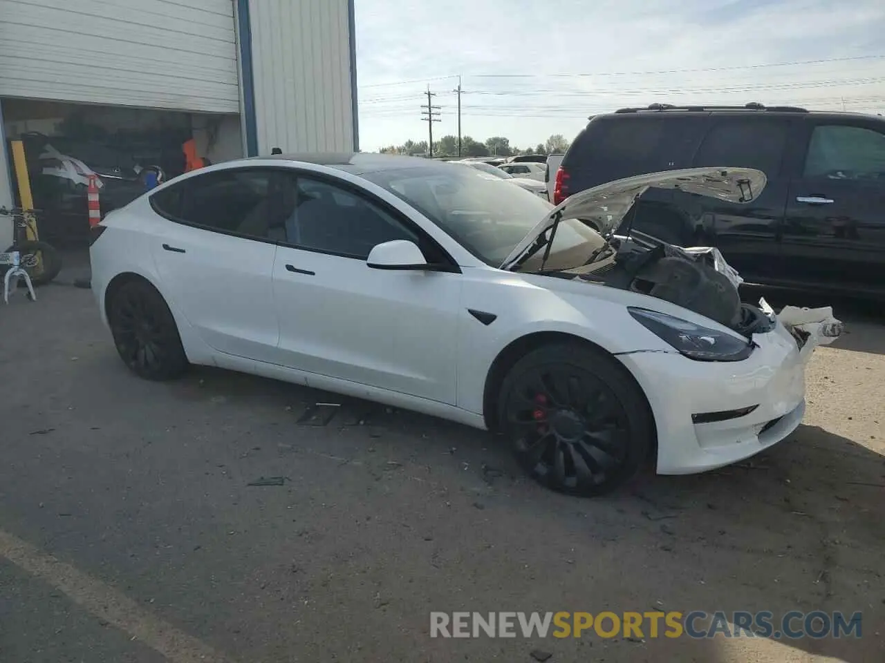 4 Photograph of a damaged car 5YJ3E1EC4PF599830 TESLA MODEL 3 2023