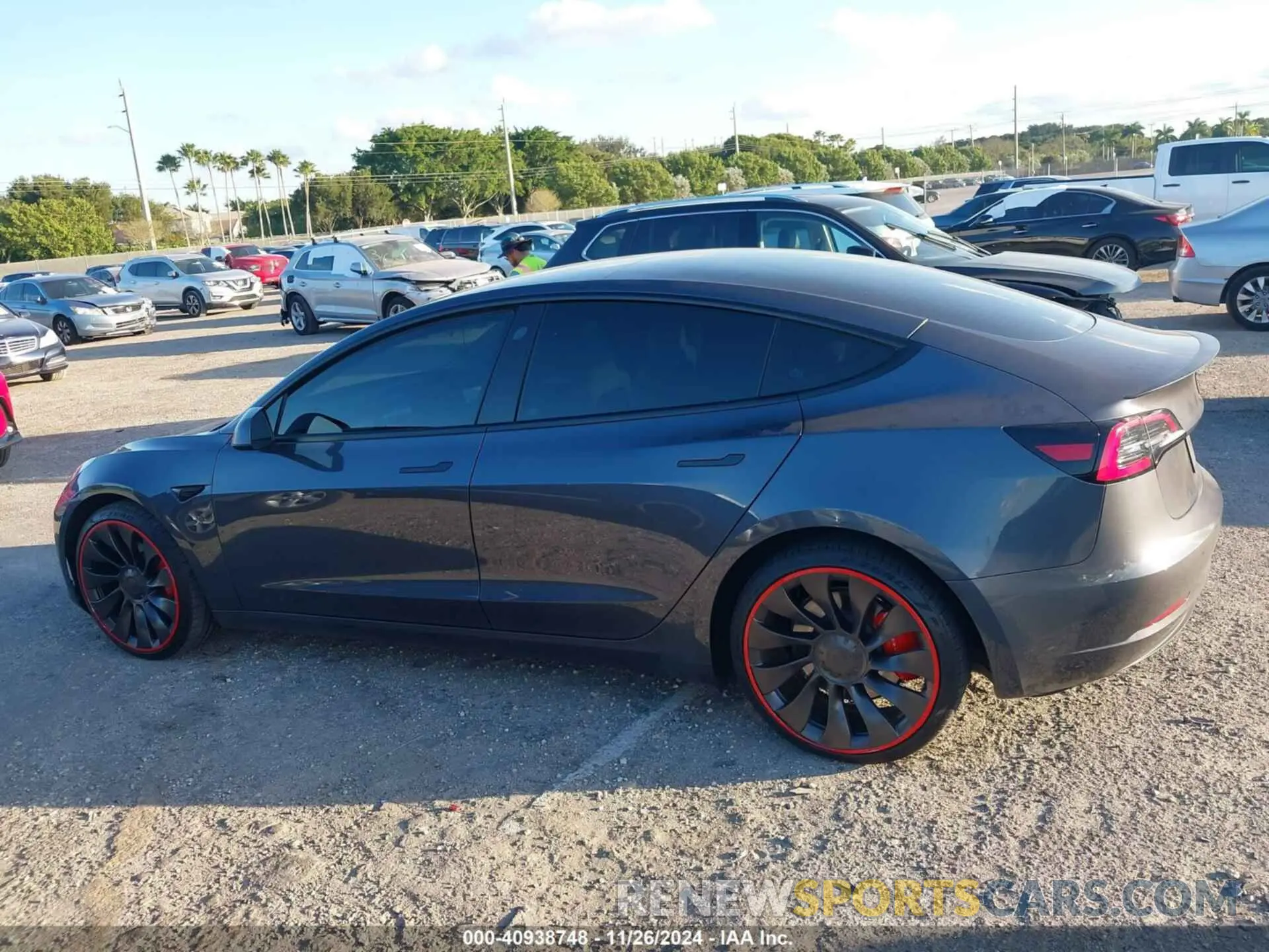 13 Photograph of a damaged car 5YJ3E1EC5PF713446 TESLA MODEL 3 2023