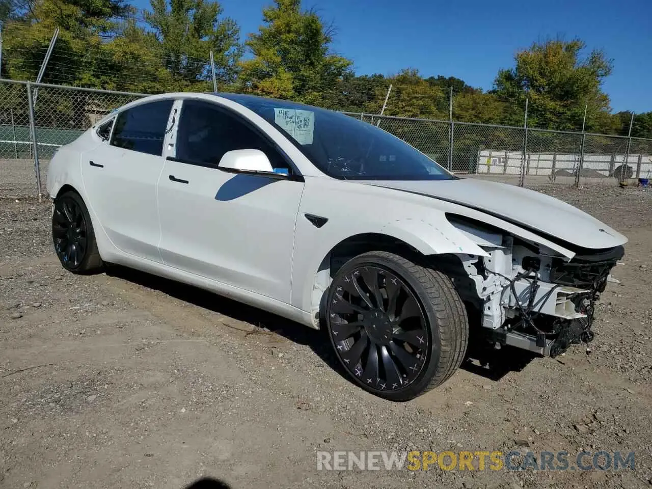 4 Photograph of a damaged car 5YJ3E1EC6PF594600 TESLA MODEL 3 2023