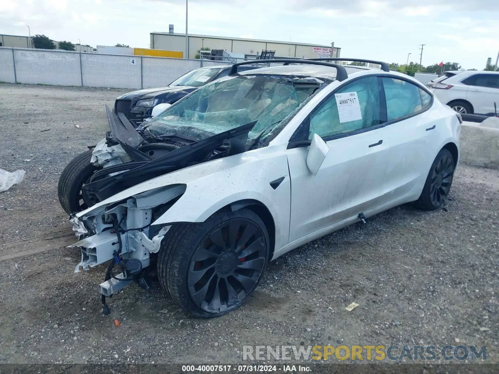 2 Photograph of a damaged car 5YJ3E1EC8PF585171 TESLA MODEL 3 2023