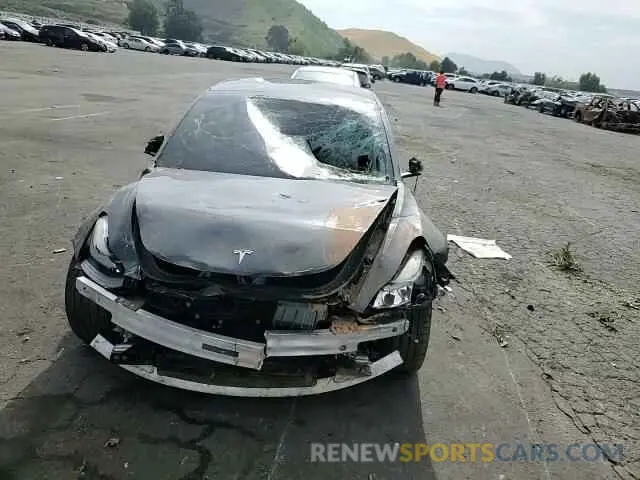 12 Photograph of a damaged car 5YJ3E1EC9PF561428 TESLA MODEL 3 2023