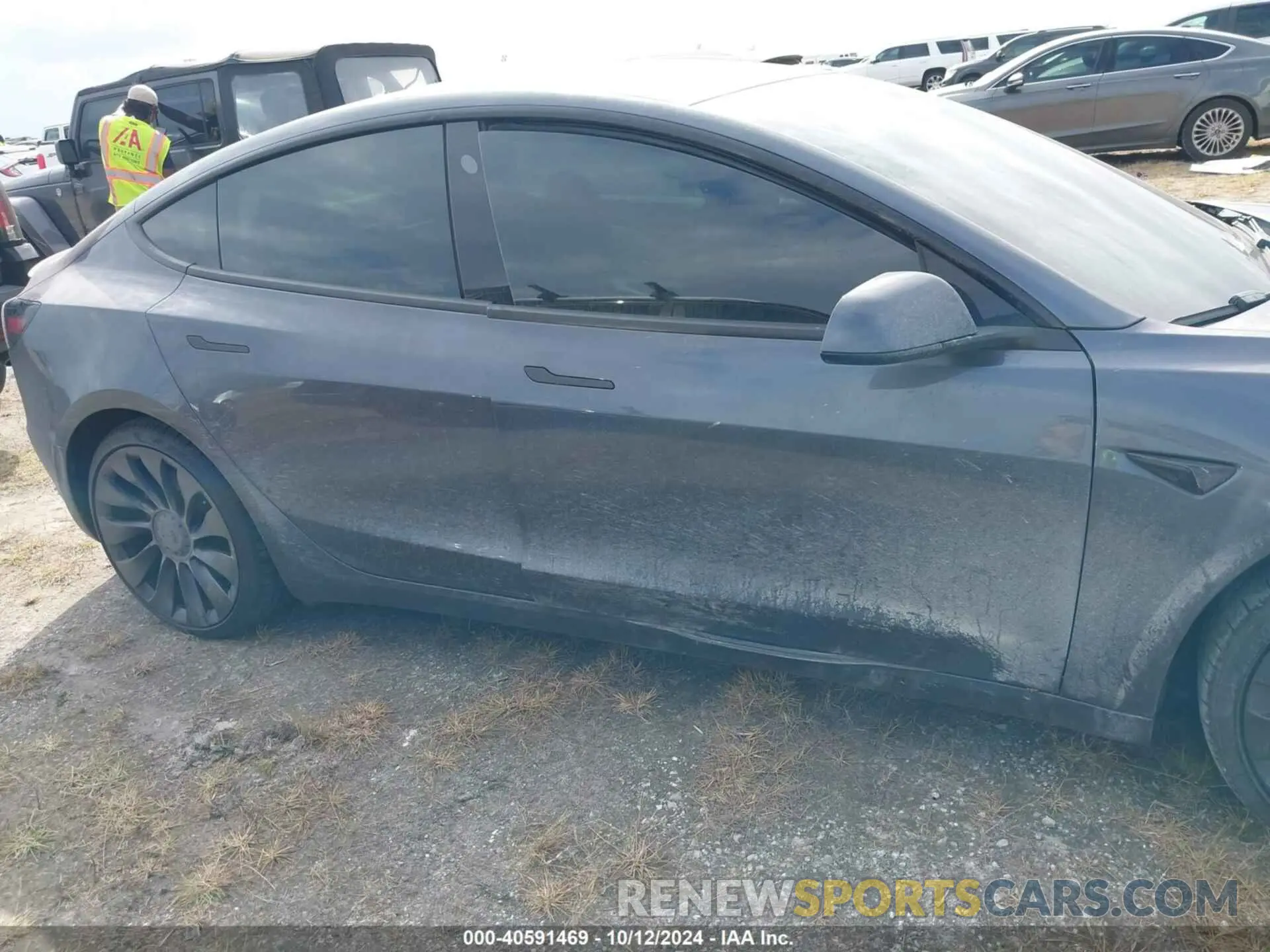 12 Photograph of a damaged car 5YJ3E1ECXPF668892 TESLA MODEL 3 2023